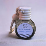 Hot Spring Car Diffuser standing on neutral backdrop 