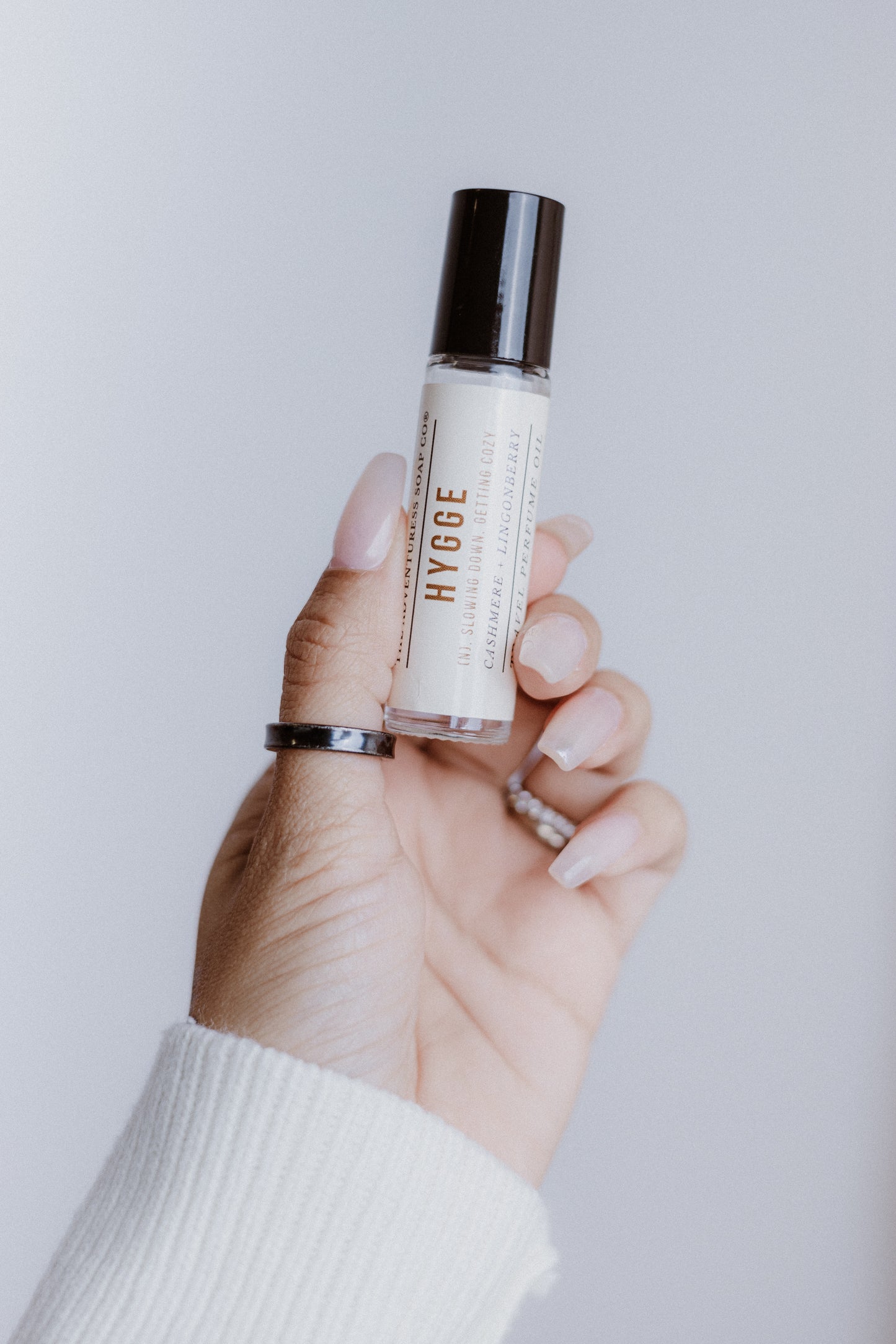 Hygge Perfume Oil being held by woman