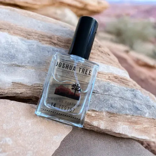 Joshua Tree Eau de Parfum laying on rock in Joshua Tree National Park