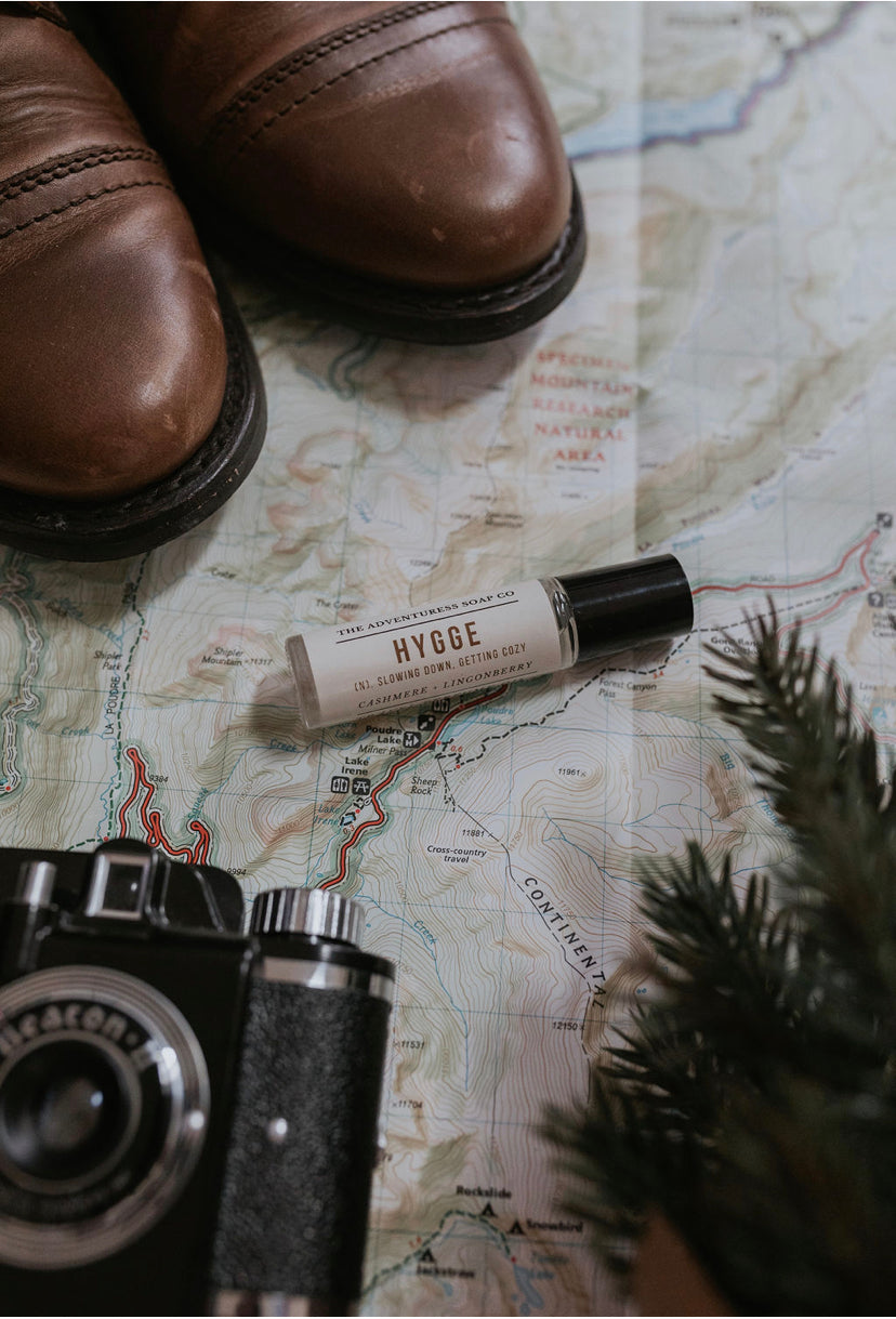 hygge perfume oil on a map background