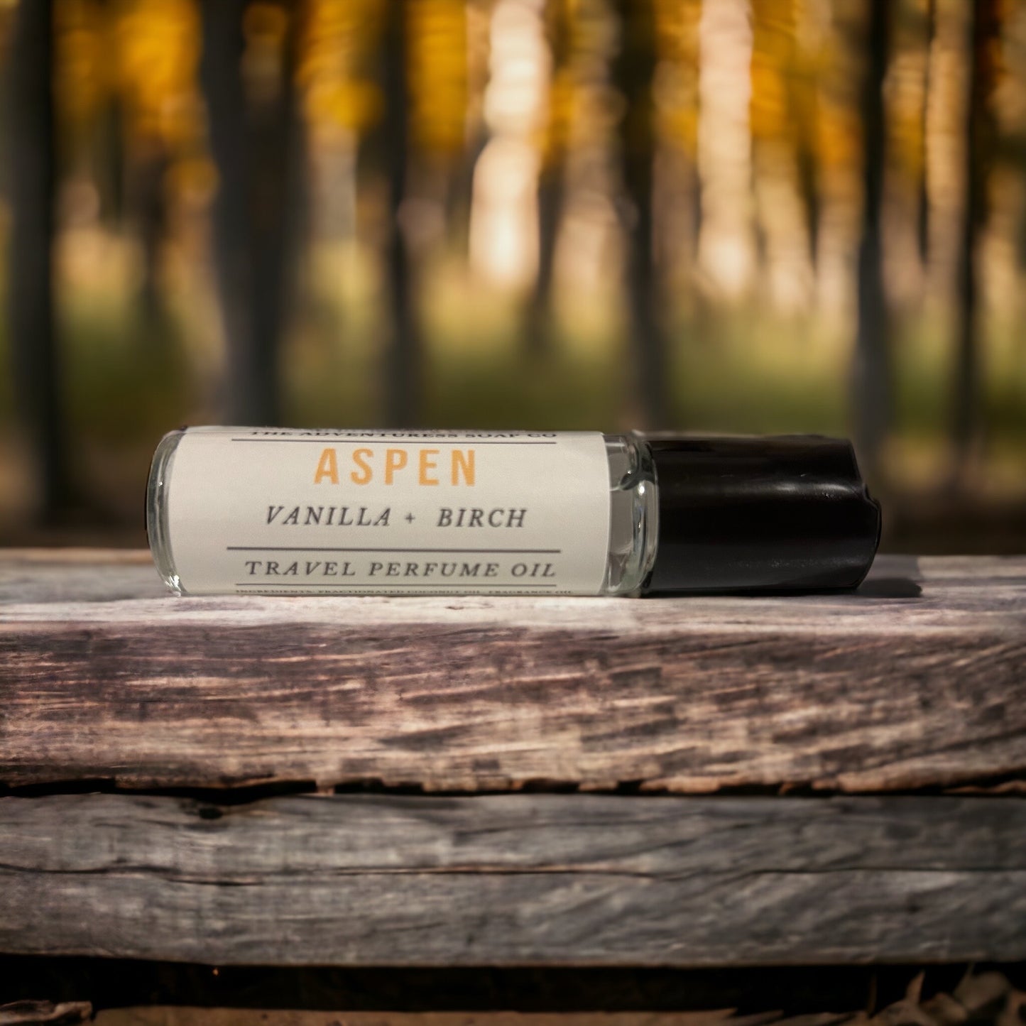 Aspen Perfume Oil with aspen grove in background.